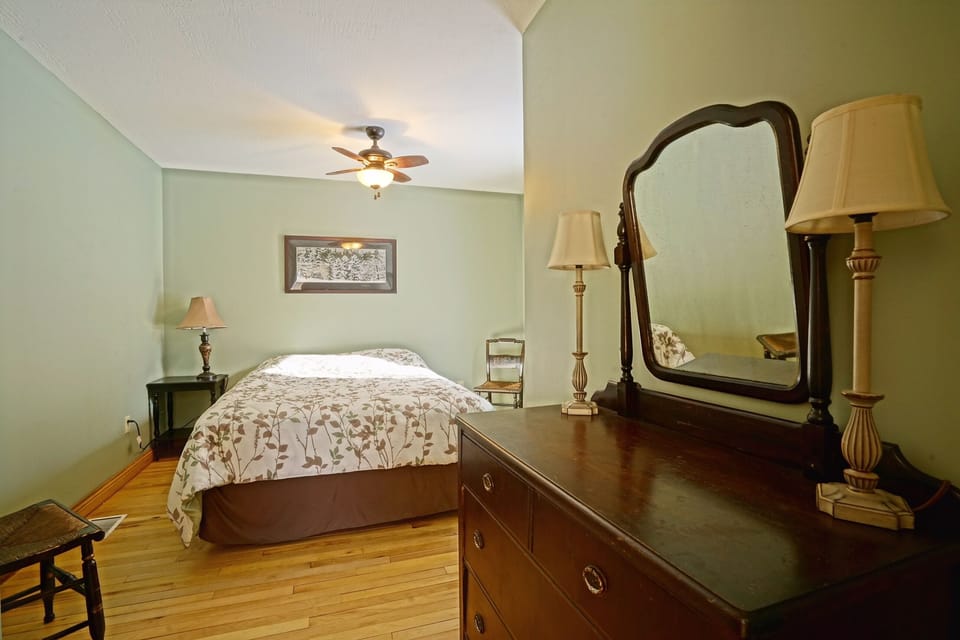 Two bedrooms both with queen beds. A pull out bed in the closet is an option.