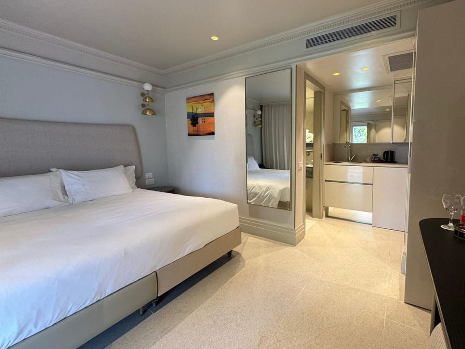 Village Superior Room | Minibar, in-room safe, desk, cribs/infant beds