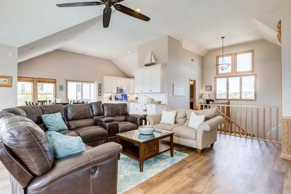 Top-Level Living Room with Deck Access
