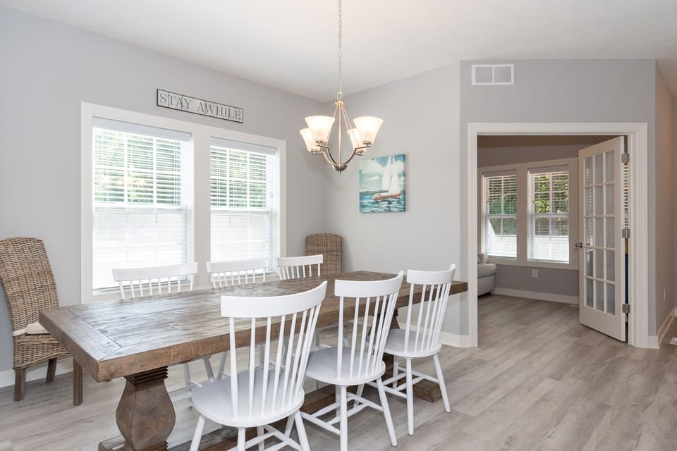 Dining area flows into the den.  