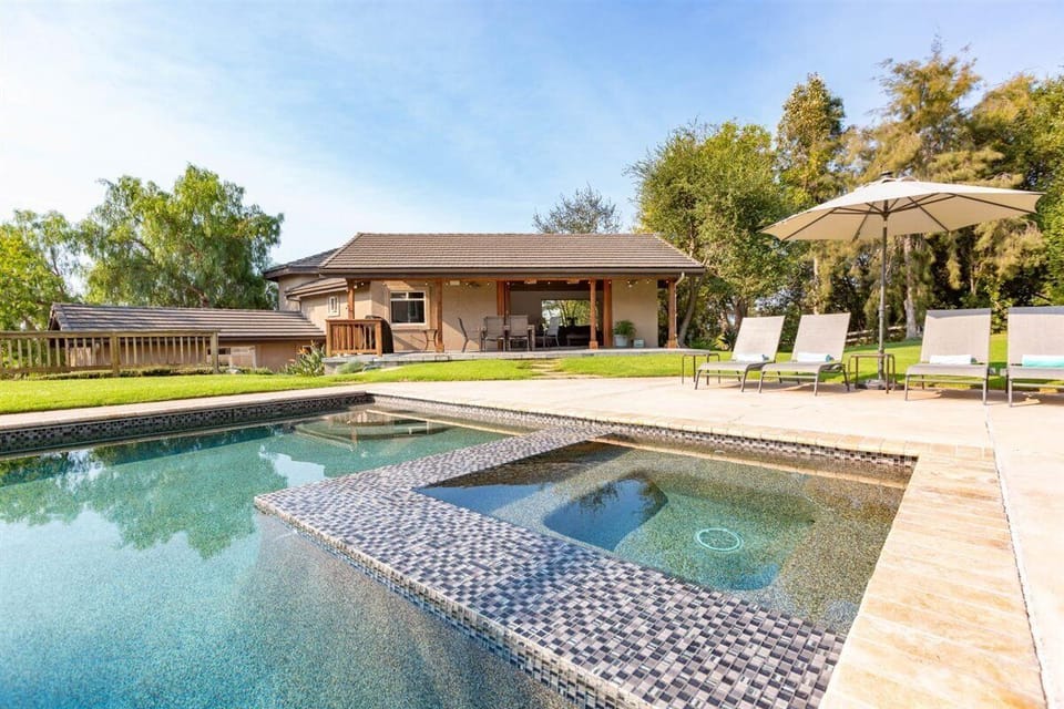 Hot-tub heated year-round. 
Pool seasonally heated April-October.