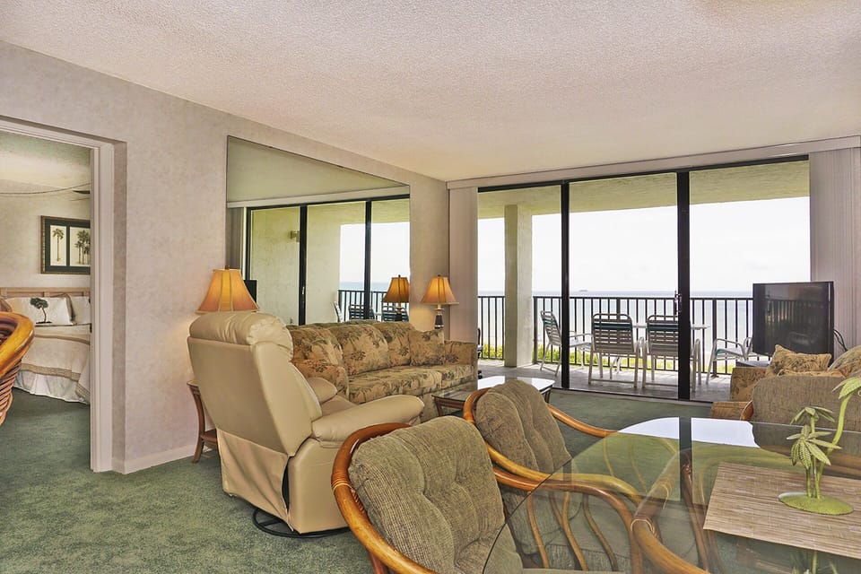 Livingroom and dining area looking toward the
 beach/ocean.