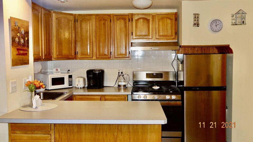 KITCHENETTE APPLIANCE; Refrigerator, Range with Gas Stove and Oven,
Range Hood, 