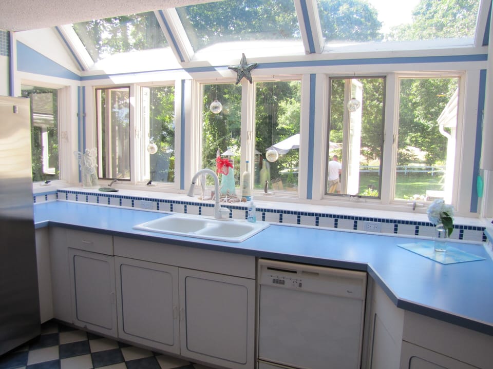 Kitchen sink area with view of back yard.