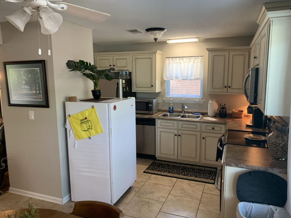 Kitchen: refrigerator, stand up freezer, dishwasher, microwave, keurig, 