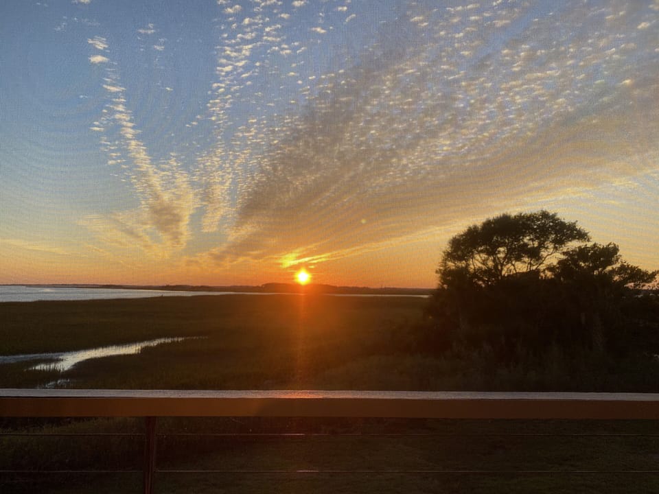 Our porch view!! Just amazing. Every sunset is a new painting! 