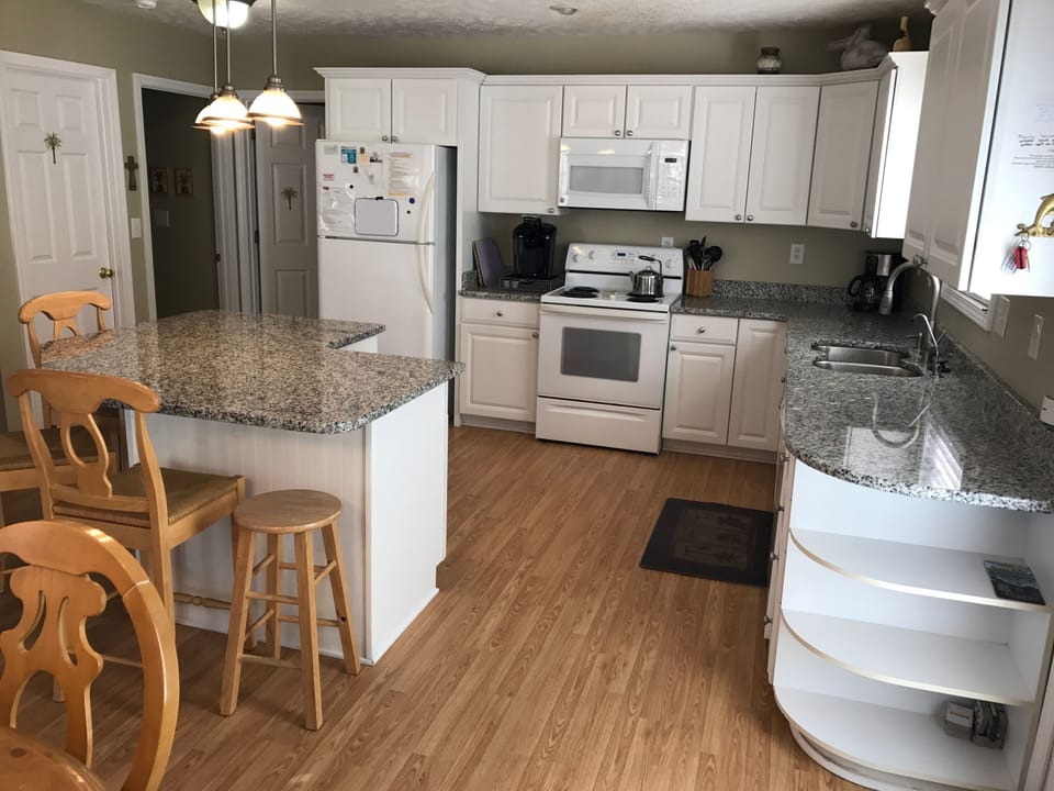 modern kitchen
laminate floors through whole house