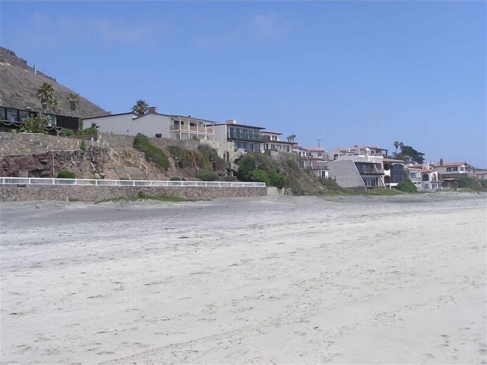 View of Uncrowded Beach and Houses