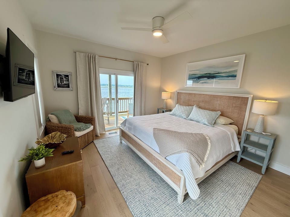 The master king suite is luxurious w/ water views from every window and deck