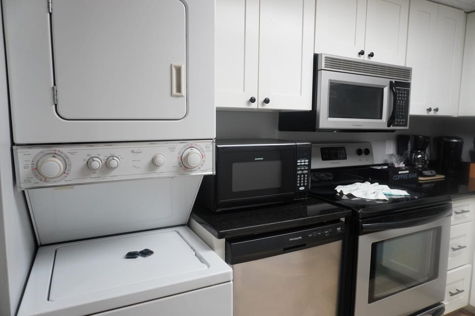 Condo, 2 Bedrooms | Private kitchen | Fridge, dishwasher, coffee/tea maker