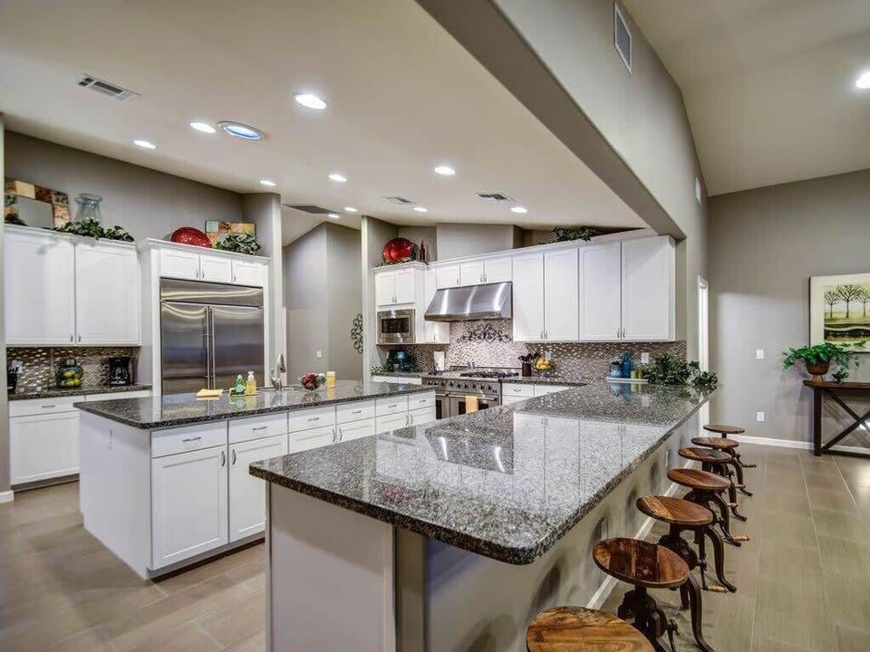 Spacious Kitchen and lot's of seating at the Breakfast Bar.