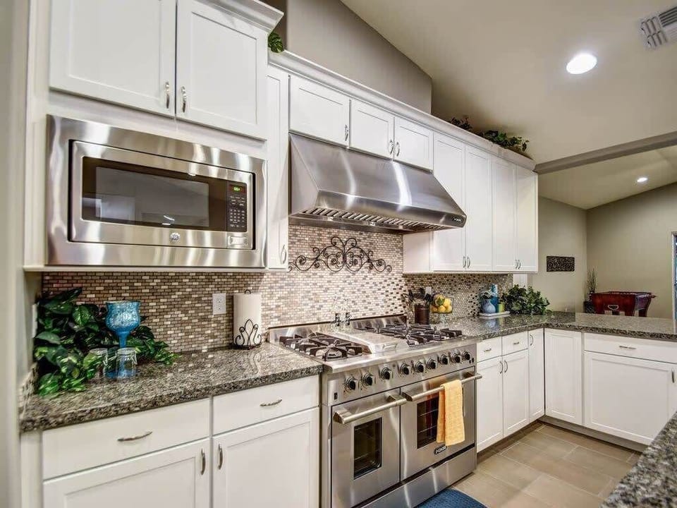  Fully Stocked Kitchen has pots, pans, cookware, large & small appliances, etc..