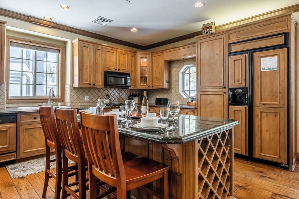 Enjoy quick breakfast or lazy afternoons noshing at the large center island.
