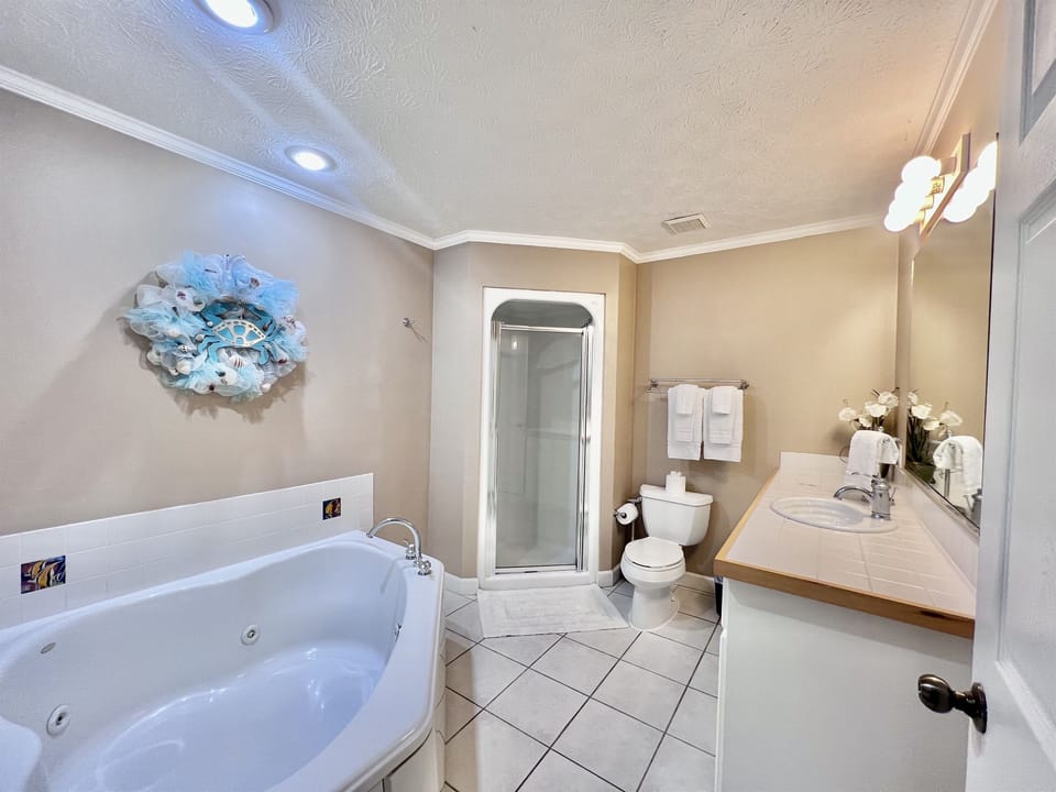 Large Bathroom with Jetted Tub and Separate Shower