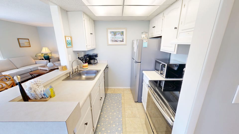 Condo, 1 Bedroom | Private kitchen | Fridge, microwave, oven, dishwasher