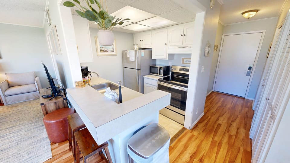 Condo, 1 Bedroom | Private kitchen | Fridge, microwave, oven, dishwasher