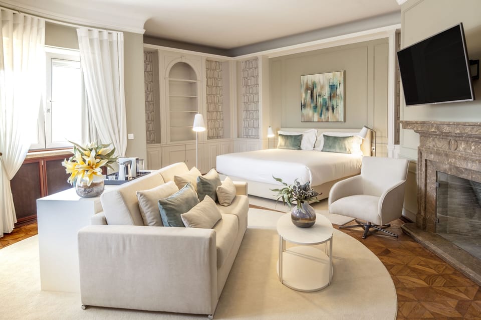 Superior Suite, Balcony, City View | Minibar, in-room safe, desk, laptop workspace