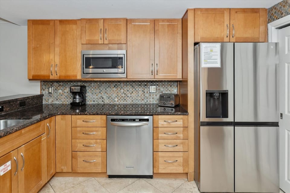 Condo, 2 Bedrooms | Private kitchen | Fridge, microwave, oven, dishwasher