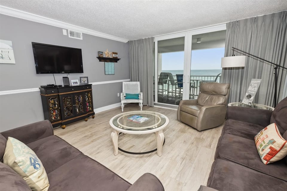 Condo, 2 Bedrooms | Living area | 30-inch TV with cable channels, DVD player