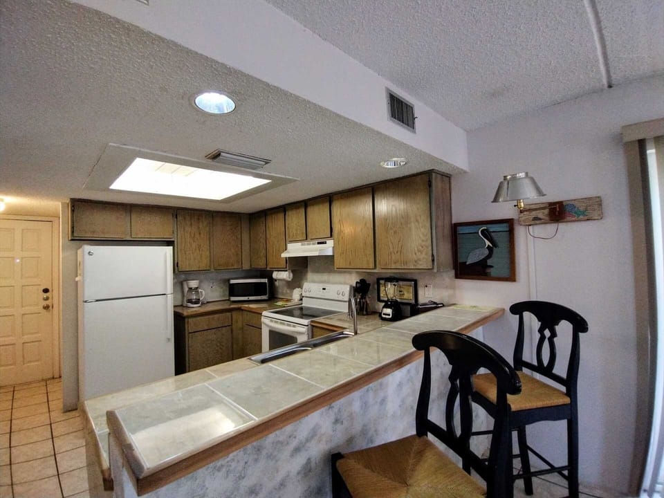 Condo, 2 Bedrooms | Private kitchen | Coffee/tea maker, fridge, oven, toaster