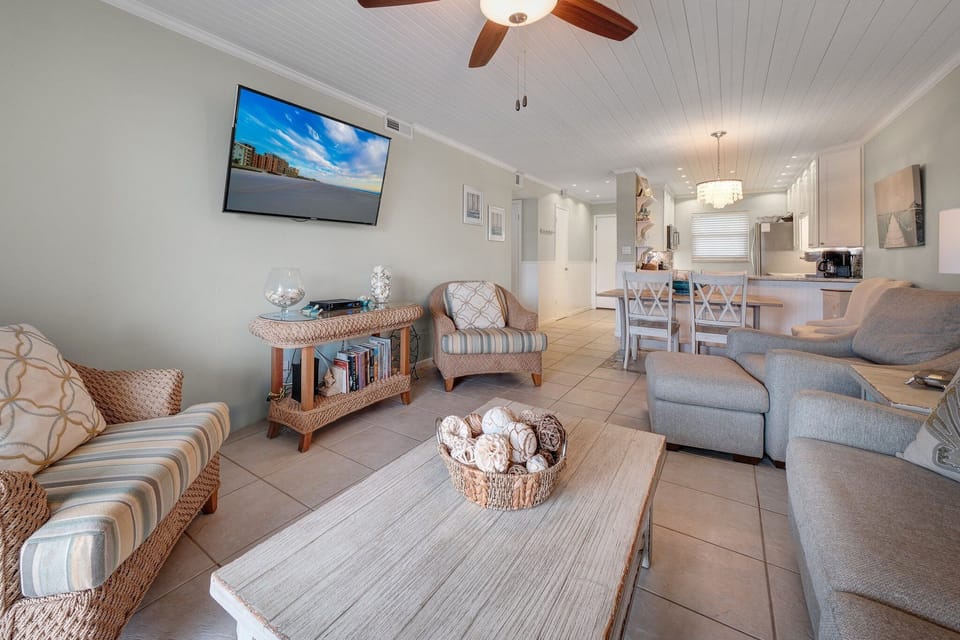 The spacious living room is the perfect spot to unwind after a fun day at New Smyrna Beach or enjoy a cozy family movie night