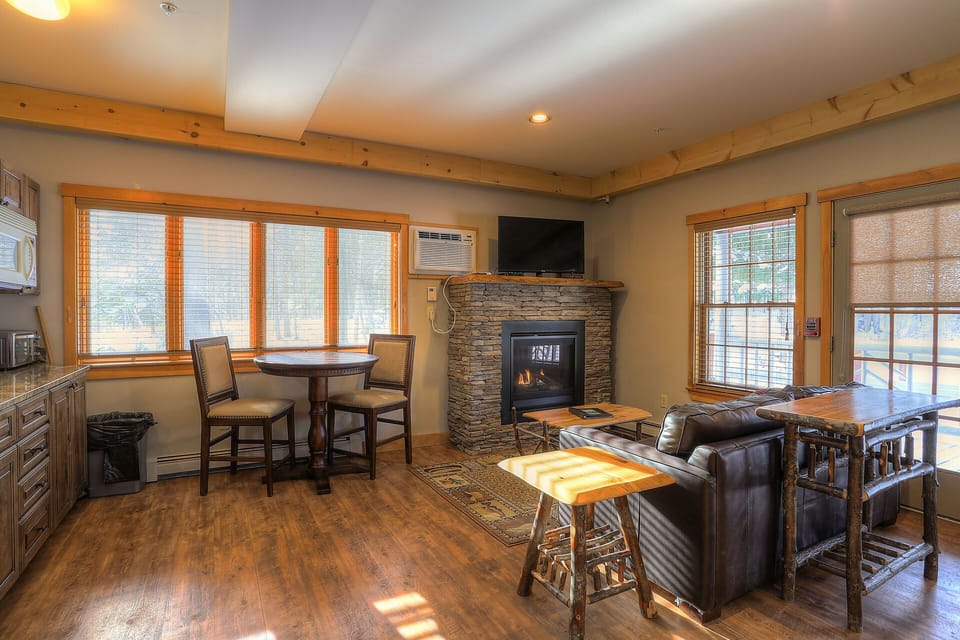 Living Room w/ Fireplace & TV