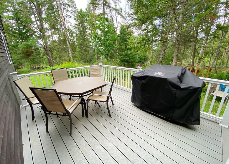 Back deck with table and grill