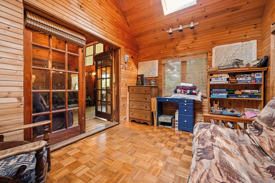 Main floor bedroom #4 - Sunroom with Double Futon