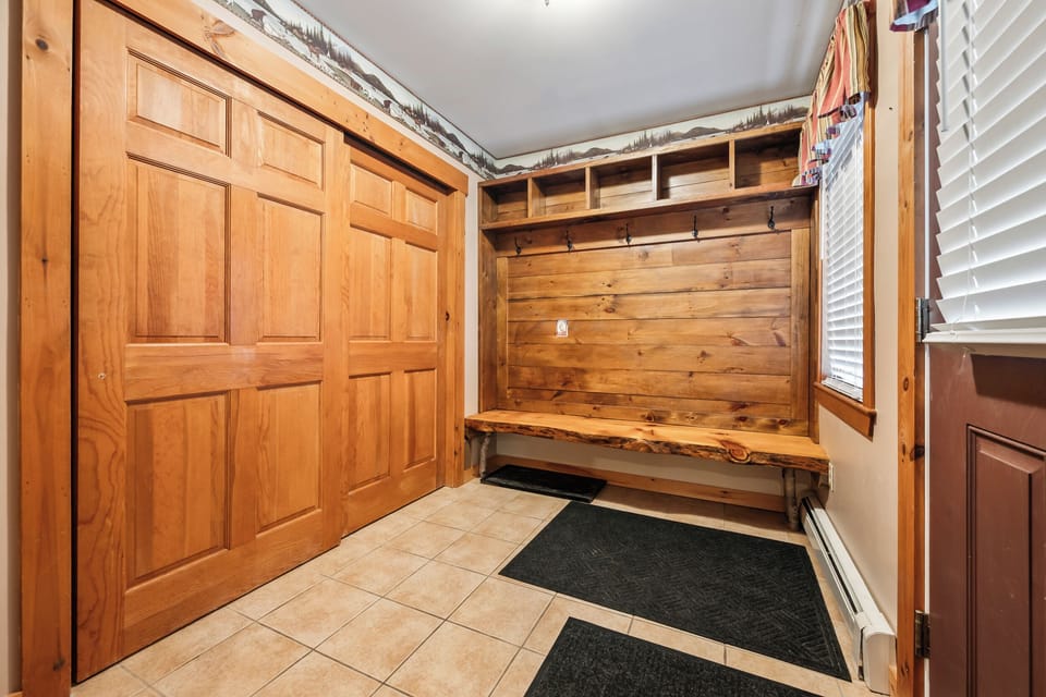 Spacious mudroom with room for all of your gear!