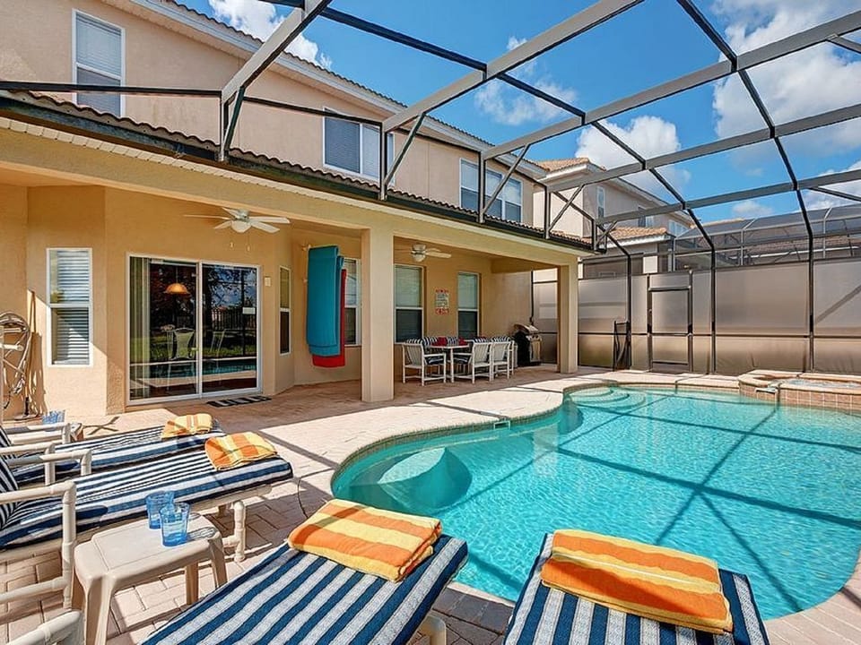Large heated pool, jacuzzi, beach towels and lounges provided!