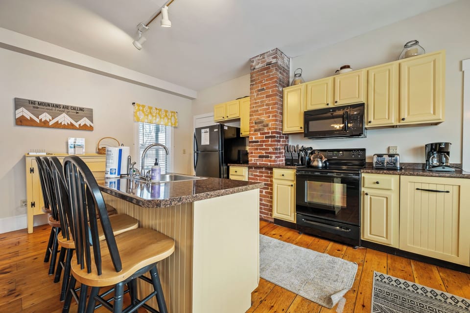 Kitchen with island seating for 4