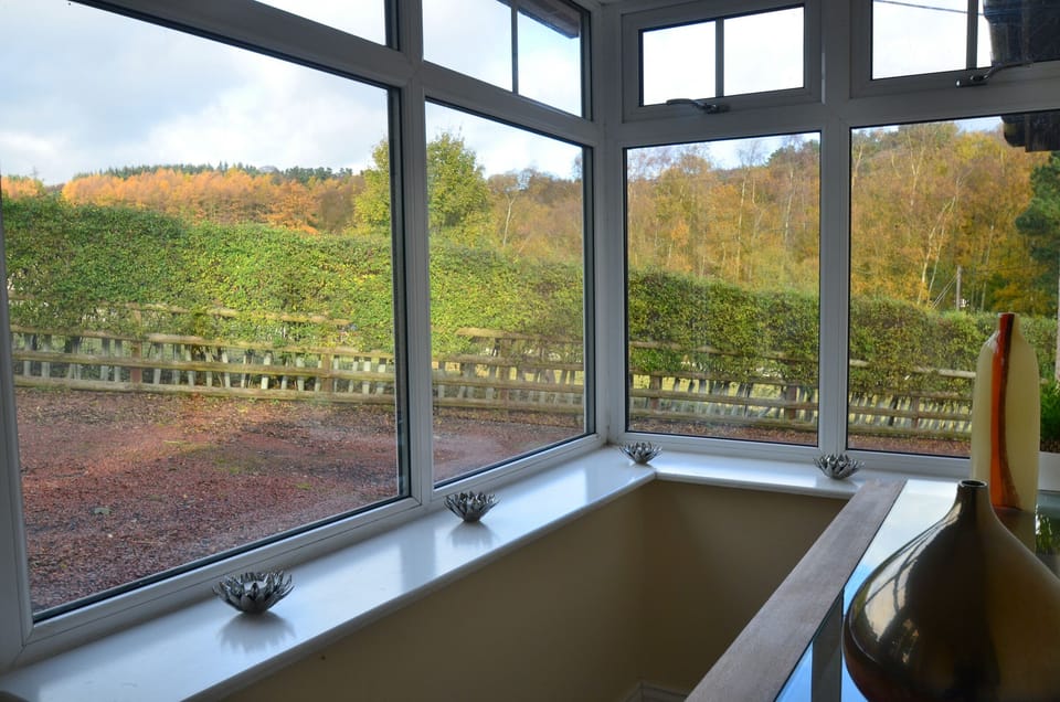 The tiled entrance porch is ideal for kicking off those muddy walking boots!