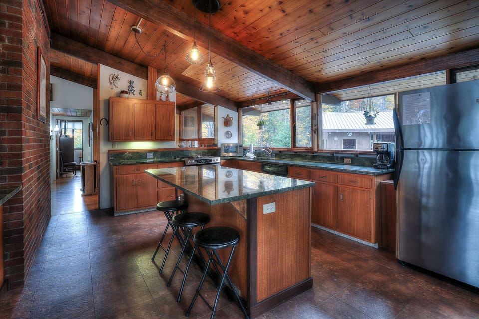 Seating for three at the large kitchen island