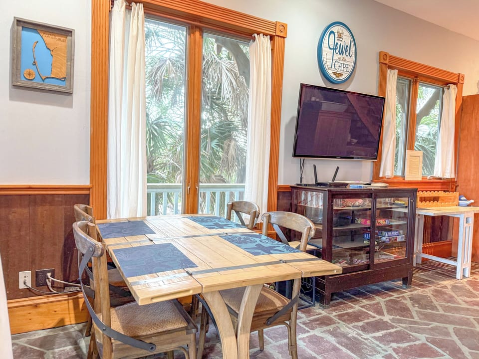 Cozy dining area in the living area off kitchen.  Also, great for puzzles!