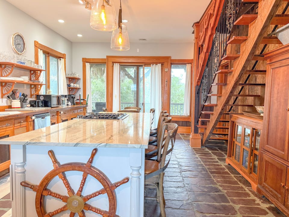 Kitchen viewing out to the outdoor dining deck.