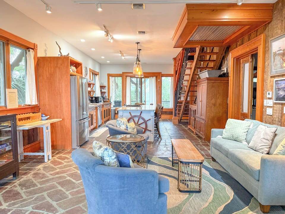 Downstairs living area as you enter the house.