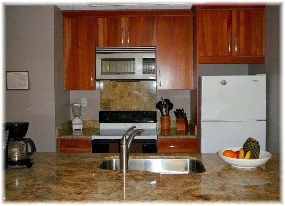 Recently upgraded w/ stone counter tops, cabinets, sink, & appliances.