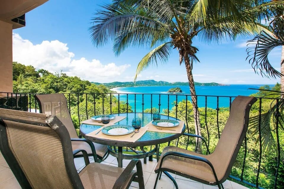Private balcony with ocean view and sitting area