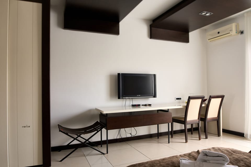 Standard Double or Twin Room | Down comforters, minibar, desk, laptop workspace