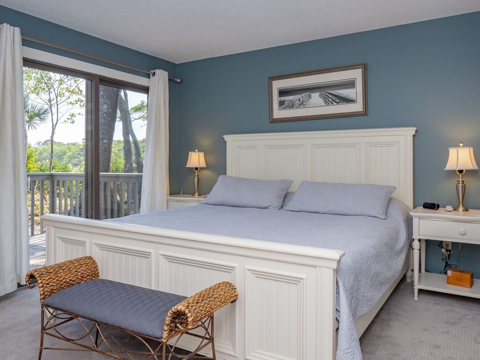 Master bedroom with sliding door access to deck