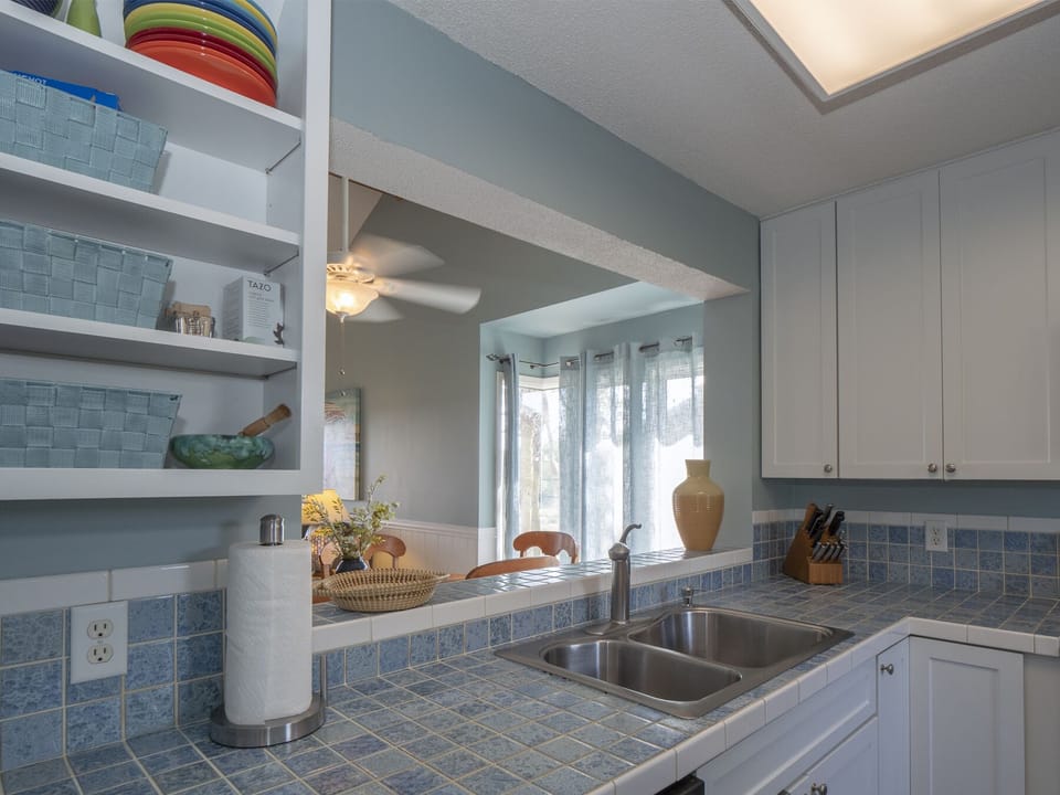Kitchen is open to the dining and living areas