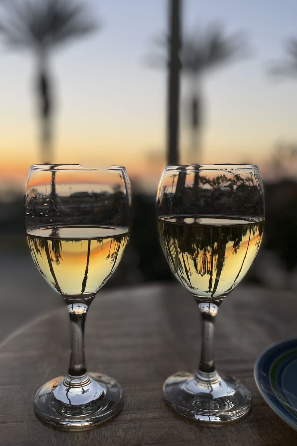 The front porch is a great spot to take in a sunset (and some wine)