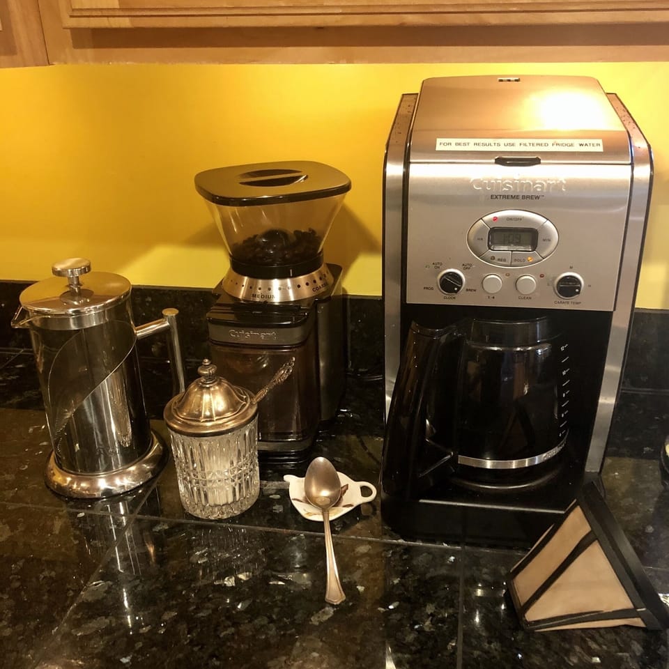 Cuisinart coffee grinder, coffee maker with gold reusable filter.  French press.