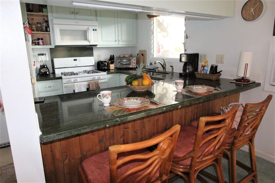 Kitchen & Bar from Living Room. Granite Counter-tops & New Cabinets