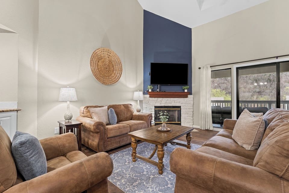 Comfortable living room with lots of seating and large Smart TV