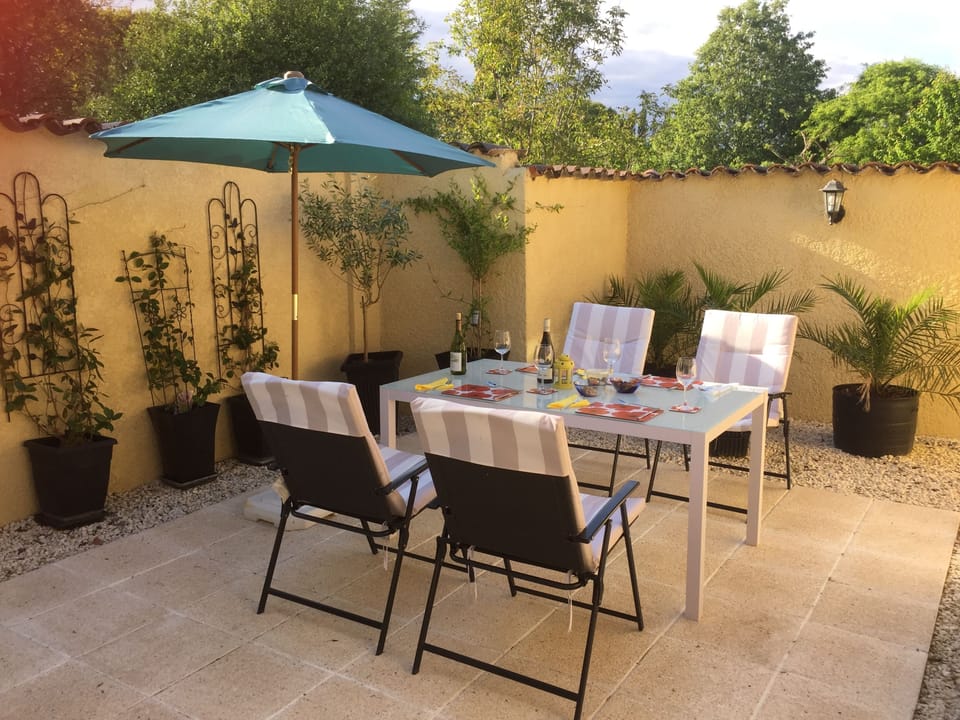 Mediterranean Courtyard opening onto extensive gardens and pool area