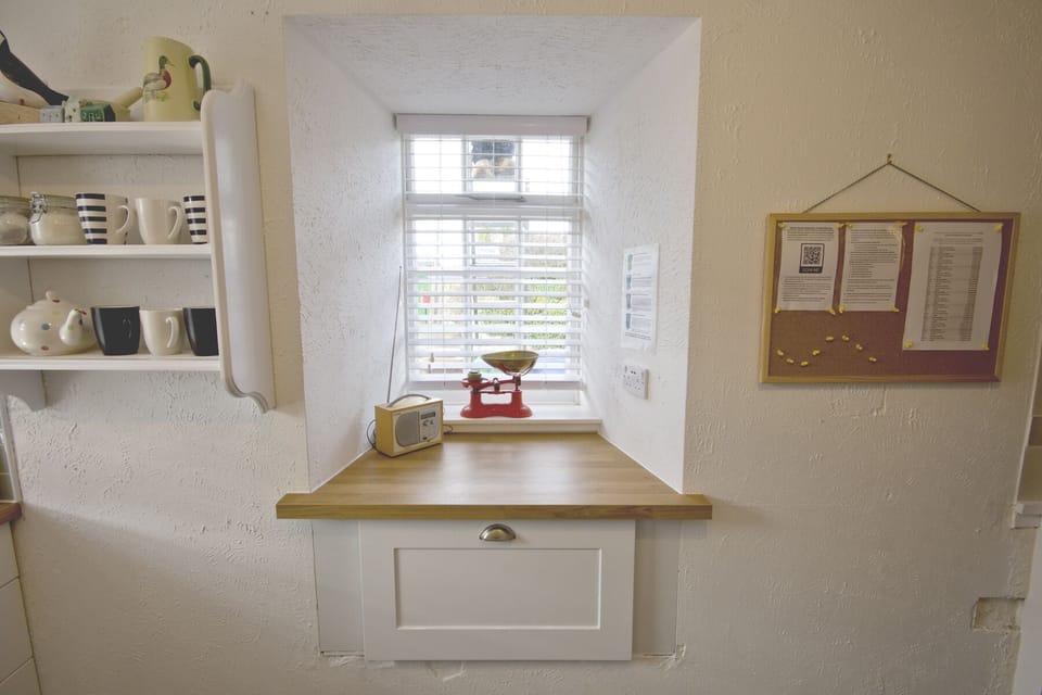 Window drawer hiding the recycling bins