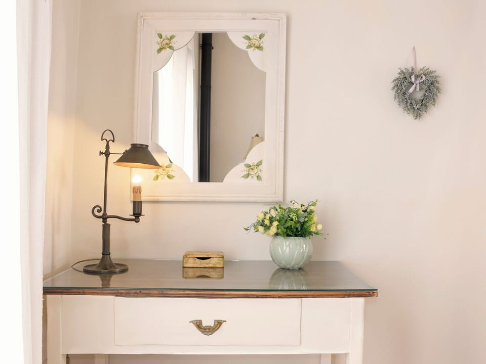 If you need a writing table, you will find it here in our main bedroom.