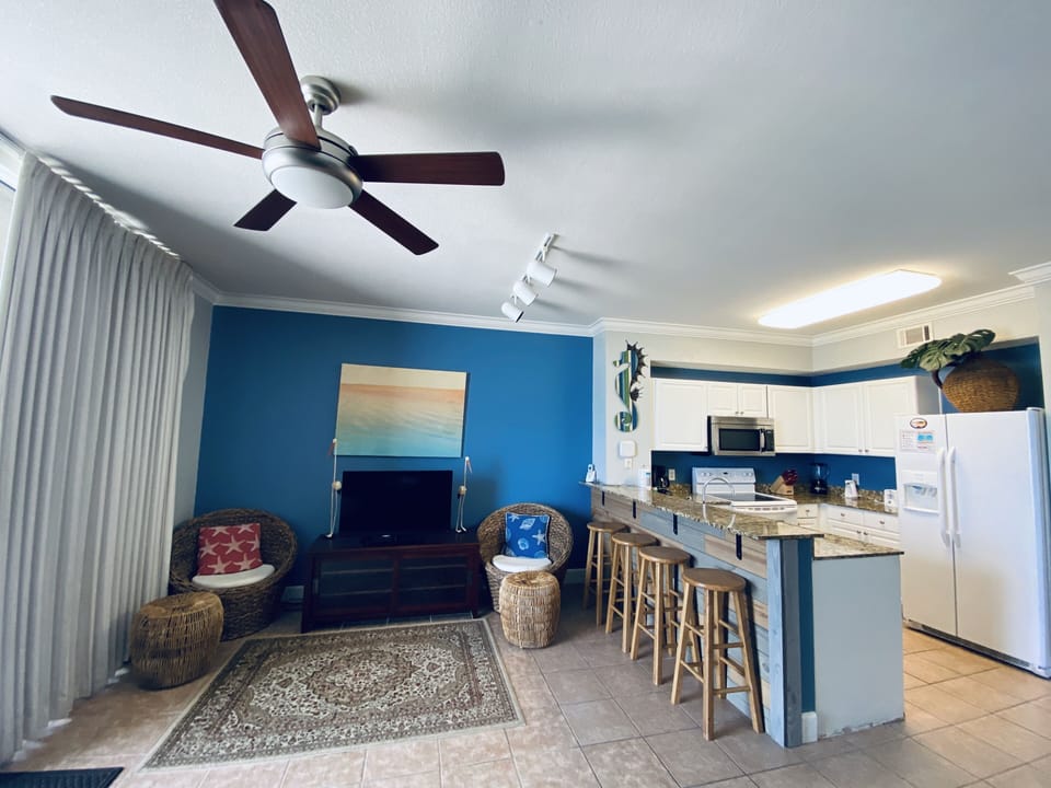 Kick back and relax in our open living area with balcony access!
