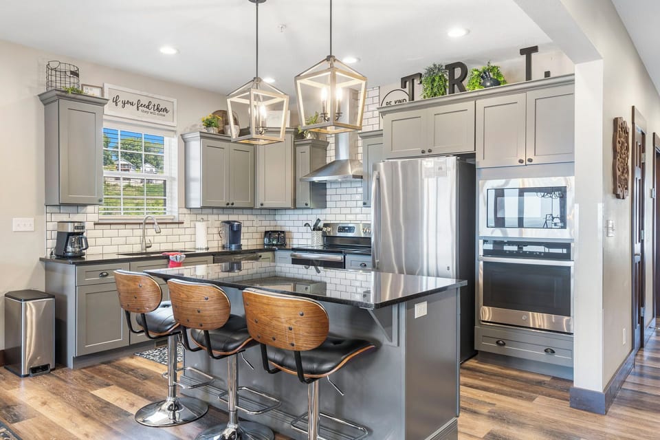 Spacious kitchen with extra seating at the island. Just bring the food!